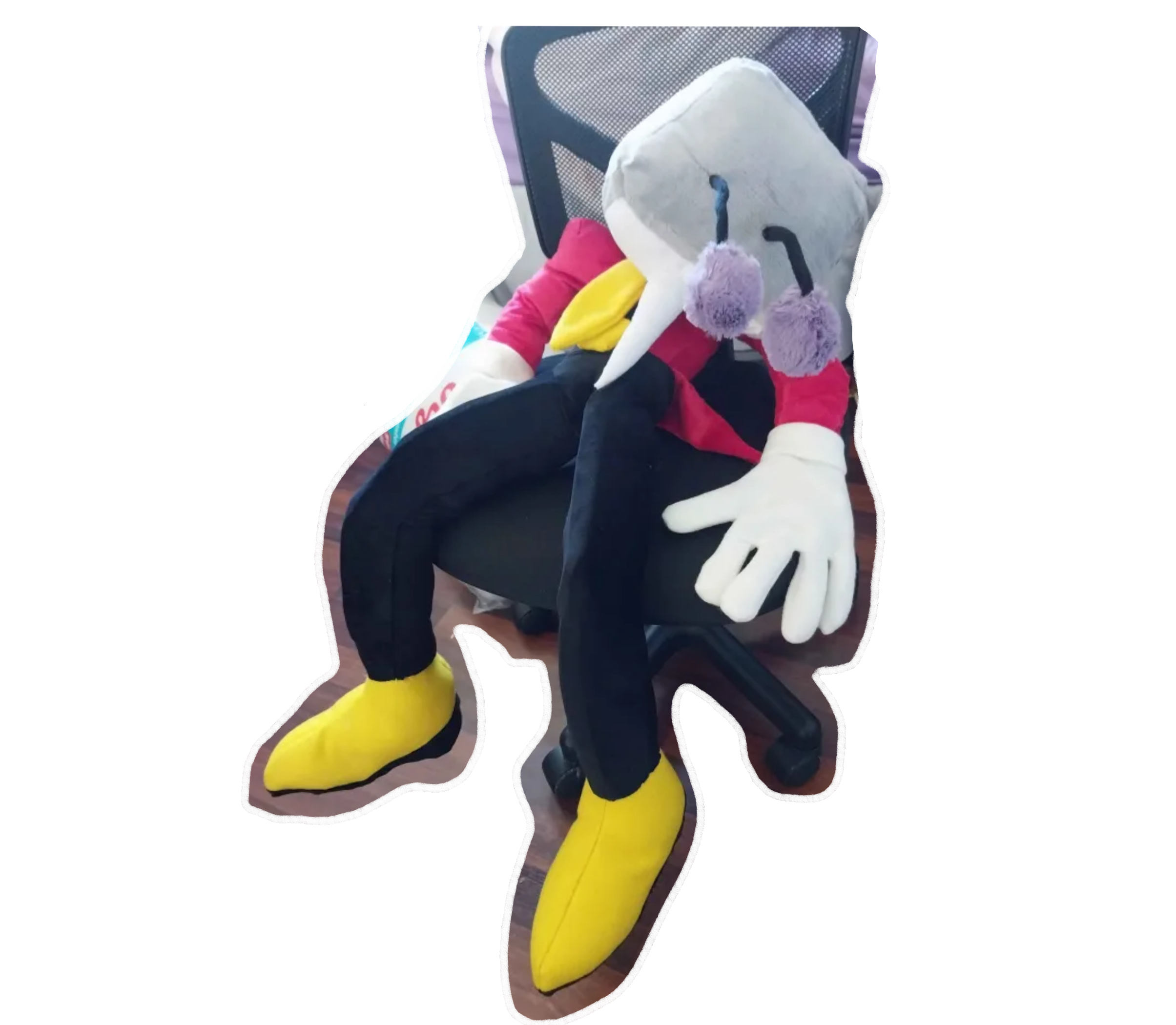 My Tenna plush that is around 2 feet tall slumped over in a wheeled chair.